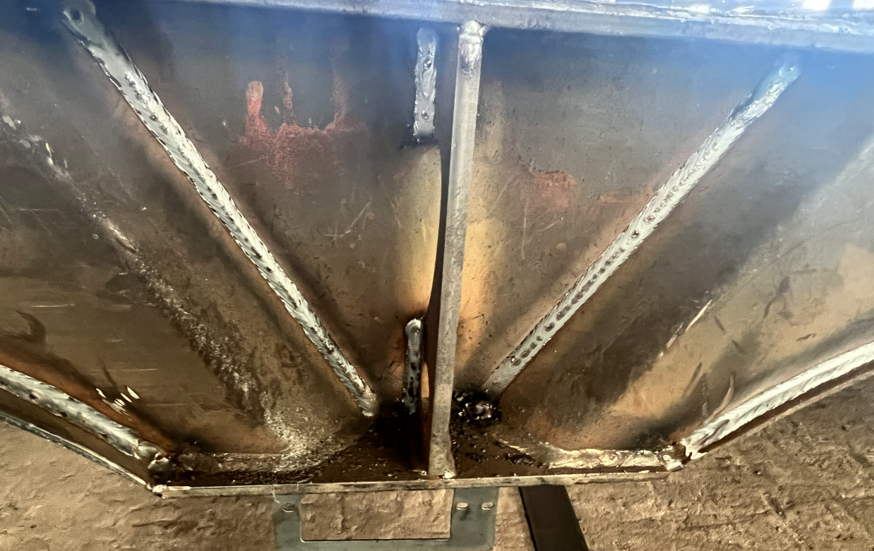 Close-up of precision heavy-duty welding on a HUAYUE trailer chassis, proving that our fast 30-day delivery never compromises structural integrity