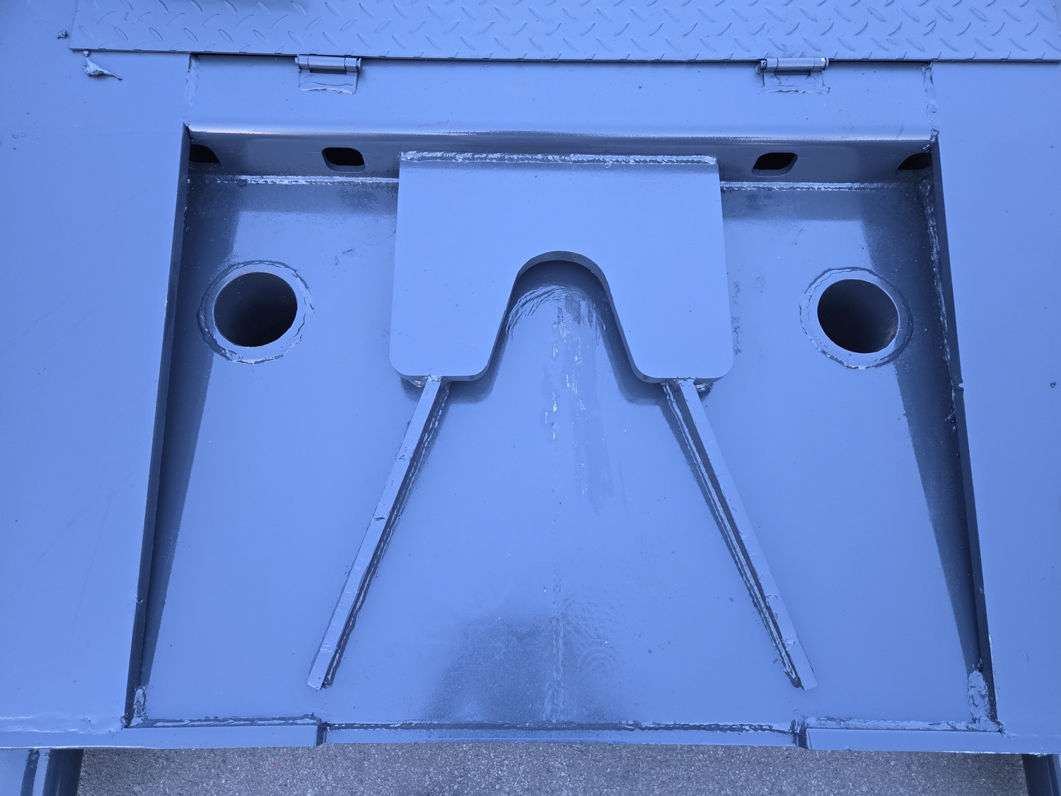 Close view of reinforced removable-gooseneck trailer connection plate and mounting openings